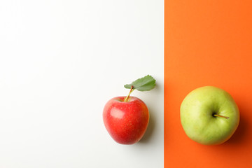 Apples on two tone background, top view