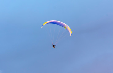 Extreme sport paragliding, at sunset