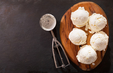 ice cream scoops on a wooden board