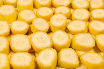 Fresh banana slices background. Top view.