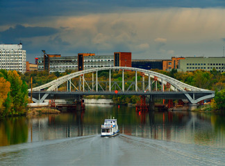 Ship under the bridge in Moscow transportation background