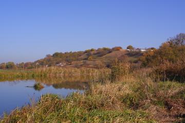Rural landscape. Beautiful river, shit and hills.