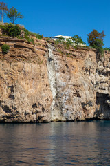 Fototapeta na wymiar Small waterfall at Antalya coast