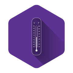 White Celsius and fahrenheit meteorology thermometers measuring heat and cold icon with long shadow. Thermometer equipment showing hot or cold weather. Purple hexagon button. Vector Illustration