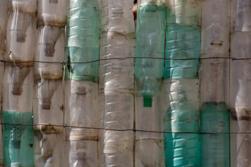wall made of recycled empty plastic bottles of water