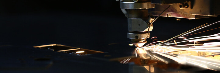Sparks fly out machine head for metal processing