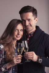 Couple clinking glasses of champagne