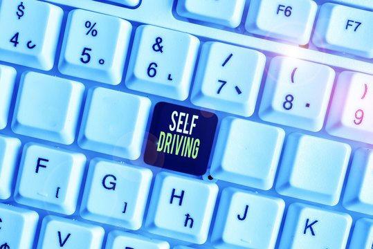 Handwriting text Self Driving. Conceptual photo Autonomous vehicle Ability to navigate without huanalysis input White pc keyboard with empty note paper above white background key copy space - Powered by Adobe