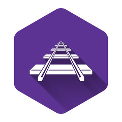 White Railroad icon isolated with long shadow. Purple hexagon button. Vector Illustration