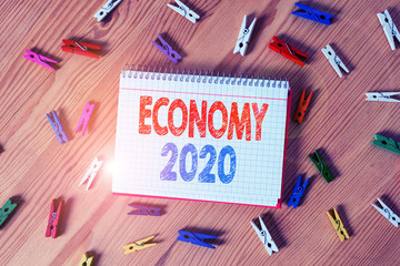 Conceptual hand writing showing Economy 2020. Concept meaning State of wealth and resources of a...