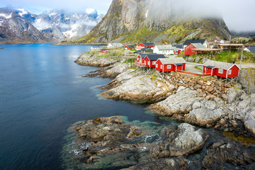 Hamnoy fishing village with red houses in Norwegian fjord. Lofoten Islands, Norway