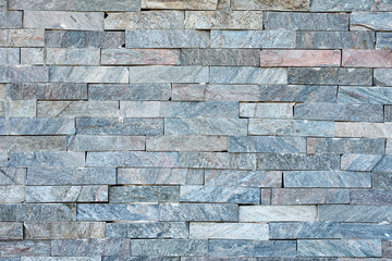 Gray stone wall as a background. Abstract texture