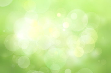 Obraz premium Green blurry background, defocused light backdrop.