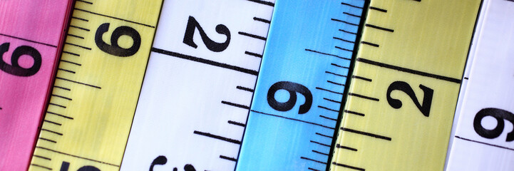 Line of colourful tapes arranged by variety of colors closeup