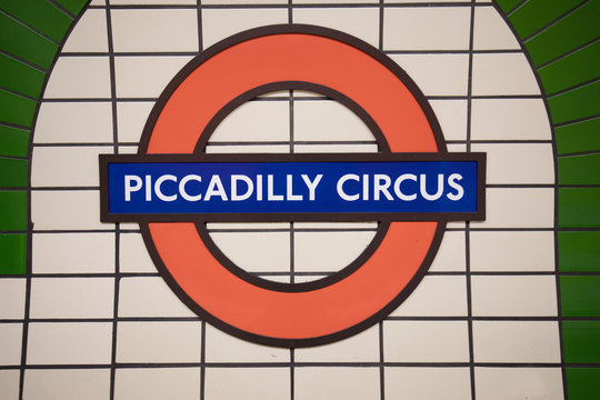 LONDON, ENGLAND - MAY 2: Detail of London Piccadilly Circus Tube sign on the wall on May 2,2017