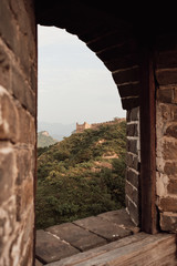 Views from inside a watchtower on the Jinshanling section of the Great Wall of China during sunset in Hebei Province, near Beijing.