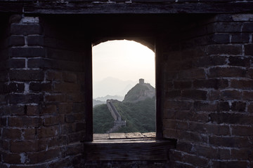 Views from inside a watchtower on the Jinshanling section of the Great Wall of China during sunset in Hebei Province, near Beijing.