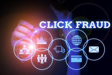 Handwriting text writing Click Fraud. Conceptual photo practice of repeatedly clicking on advertisement hosted website Male human wear formal work suit presenting presentation using smart device