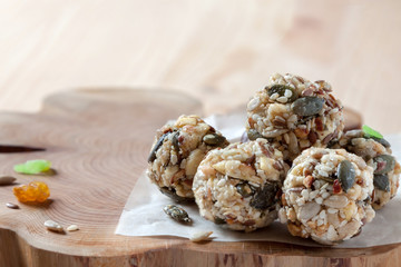 Dates energy homemade no cooked organic seeds nuts vegan oatmeal balls wooden rustic background