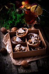 Christmas Mince pies on a Christmas rustic background