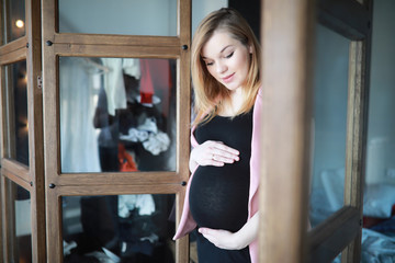 Pregnant young beautiful girl on the ninth month