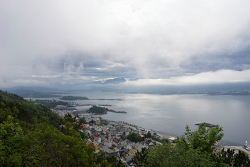 From the bird's eye view of Alesund port town on the west coast of Norway, at the entrance to the Geirangerfjord.