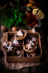 Christmas Mince pies on a Christmas rustic background