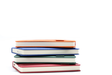 Lot of diary isolated on white background