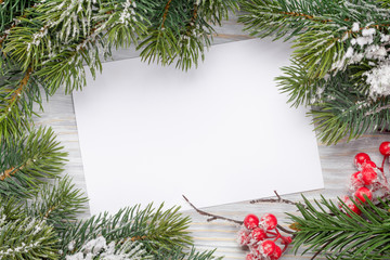 Fototapeta na wymiar Christmas card and fir tree branch