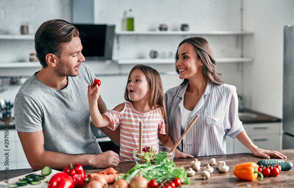 Wall mural family in kitchen