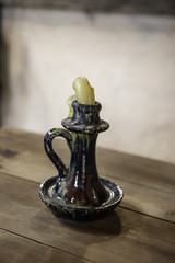Old candlestick with candle