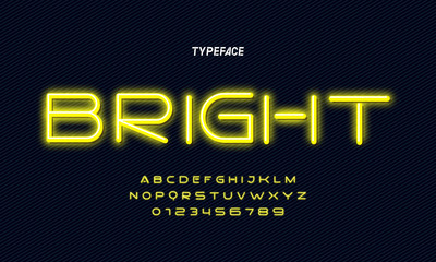 Yellow neon light glowing alphabet. Vector.