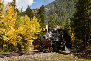 Vintage Steam Train With Autumn Scenery Background.