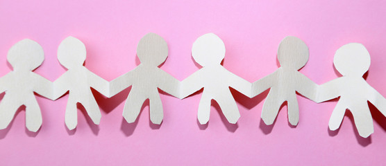 Paper chain team holding hands