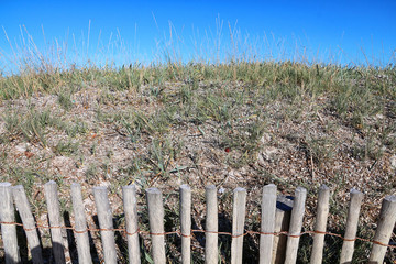 Beach fence protection sand dunes on french mediterranean shores