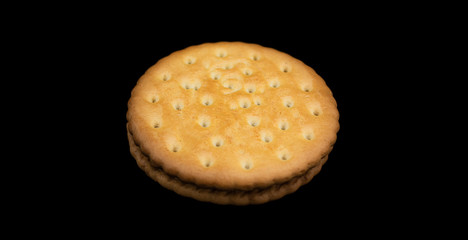 Golden cookies filled with chocolate for children