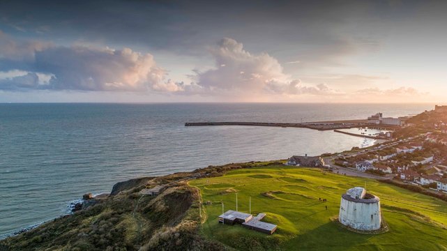 Folkestone's Martello Tower and Harbour Arm just before sunset