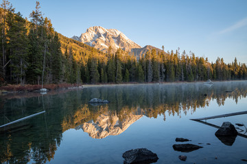 Mountains Reflected in Lake at Dawn