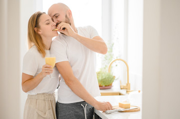 young couple making Breakfast in the morning. Young family. relationship 