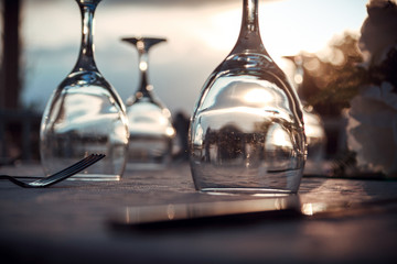 dinnerware and gun sunset view