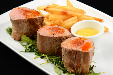grilled meat with sauce and vegetables