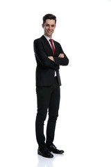 Positive businessman holding his hands folded