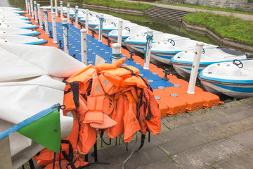 A temporary marina and moored boats on a pond in the Silesian Park in Chorz&oacute;w