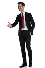 Cheerful businessman and giving a handshake