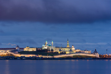 Kazan Kremlin with Presidential Palace, Annunciation Cathedral, Soyembika Tower, Qolsharif Mosque from the embankment near the center family and marriage with the bright blue sky at night.