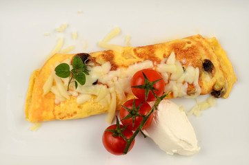 Eggs with vegetables and sauce