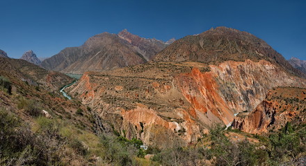 Tajikistan. The Pamir highway. Panorama of the mountain river Iskanderdarya flowing from lake Iskanderkul.