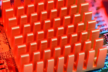 Close up of red spiked heat sink as background