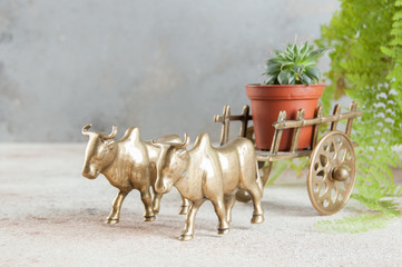 Antique bronze ox and cart sculpture