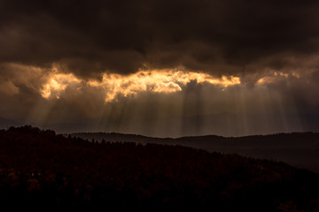 Dark clouds and sun rays